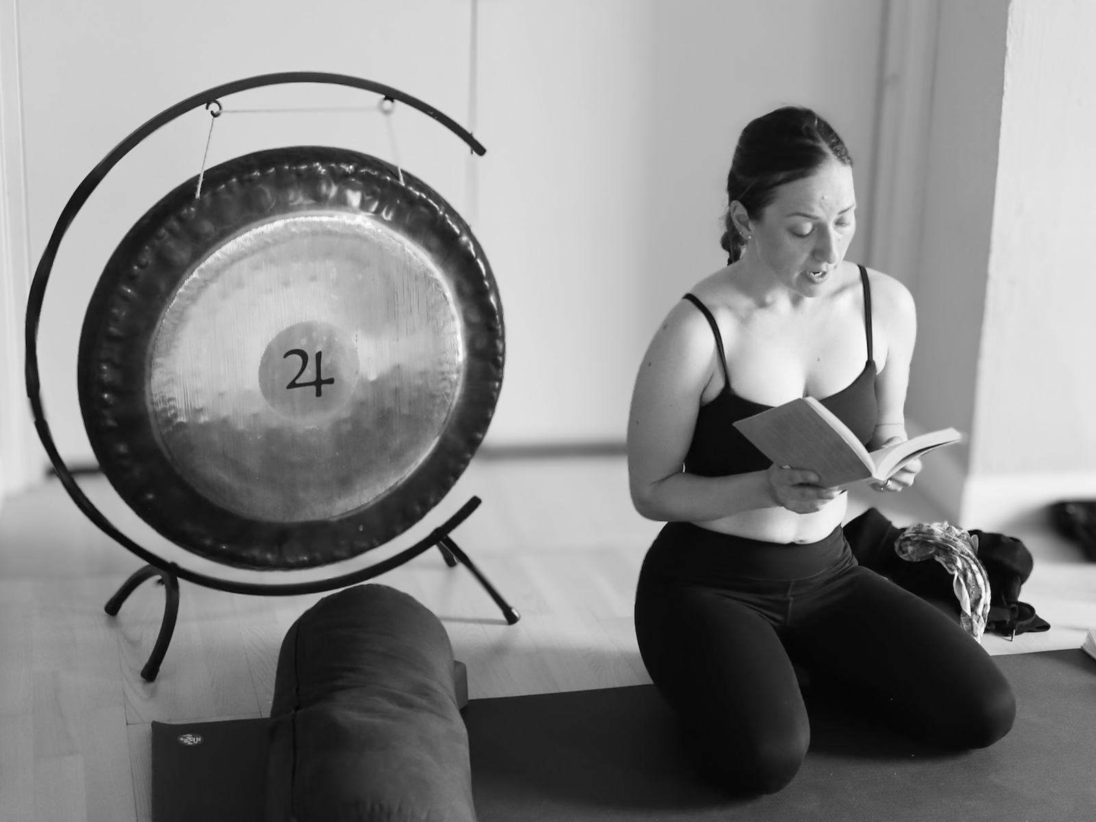 student by a gong during the 300 hour teacher training core module 1