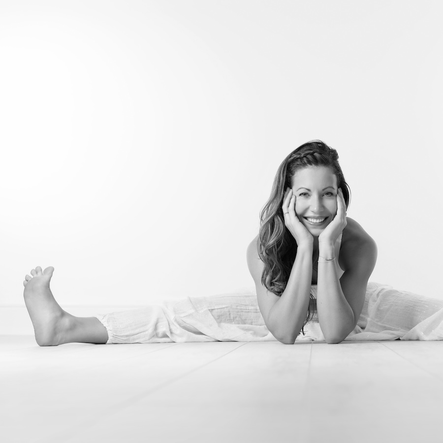 Emma Landolt photographed demonstrating her flexibility during yoga practices