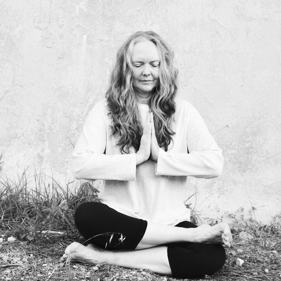 Melanie Cooper on prayer pose.