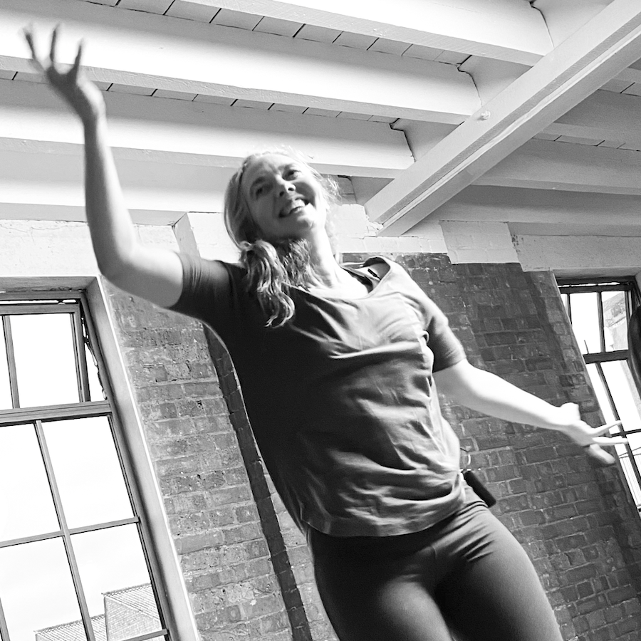 Photo of Melanie Cooper dancing bollywood , during her course at shala school of yoga
