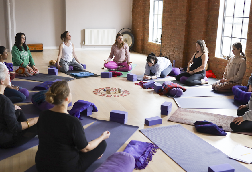 Pregnancy yoga trainee leading a practice class at the Shala London
