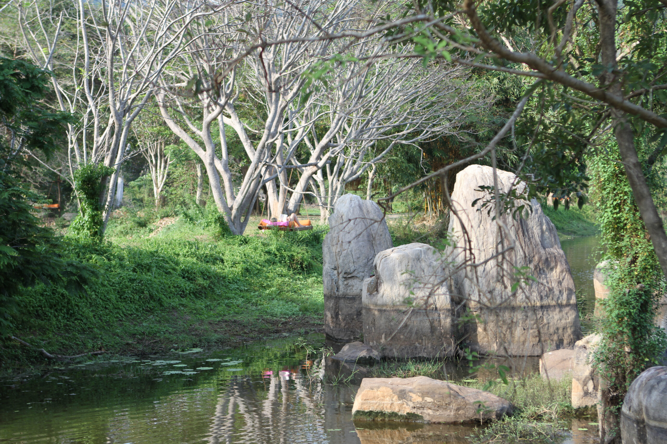 Relaxing by the lake at Ulpotha Retreat Centre in Sri Lanka