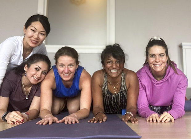 200 hour students of the Shala School of Yoga smiling for the camera