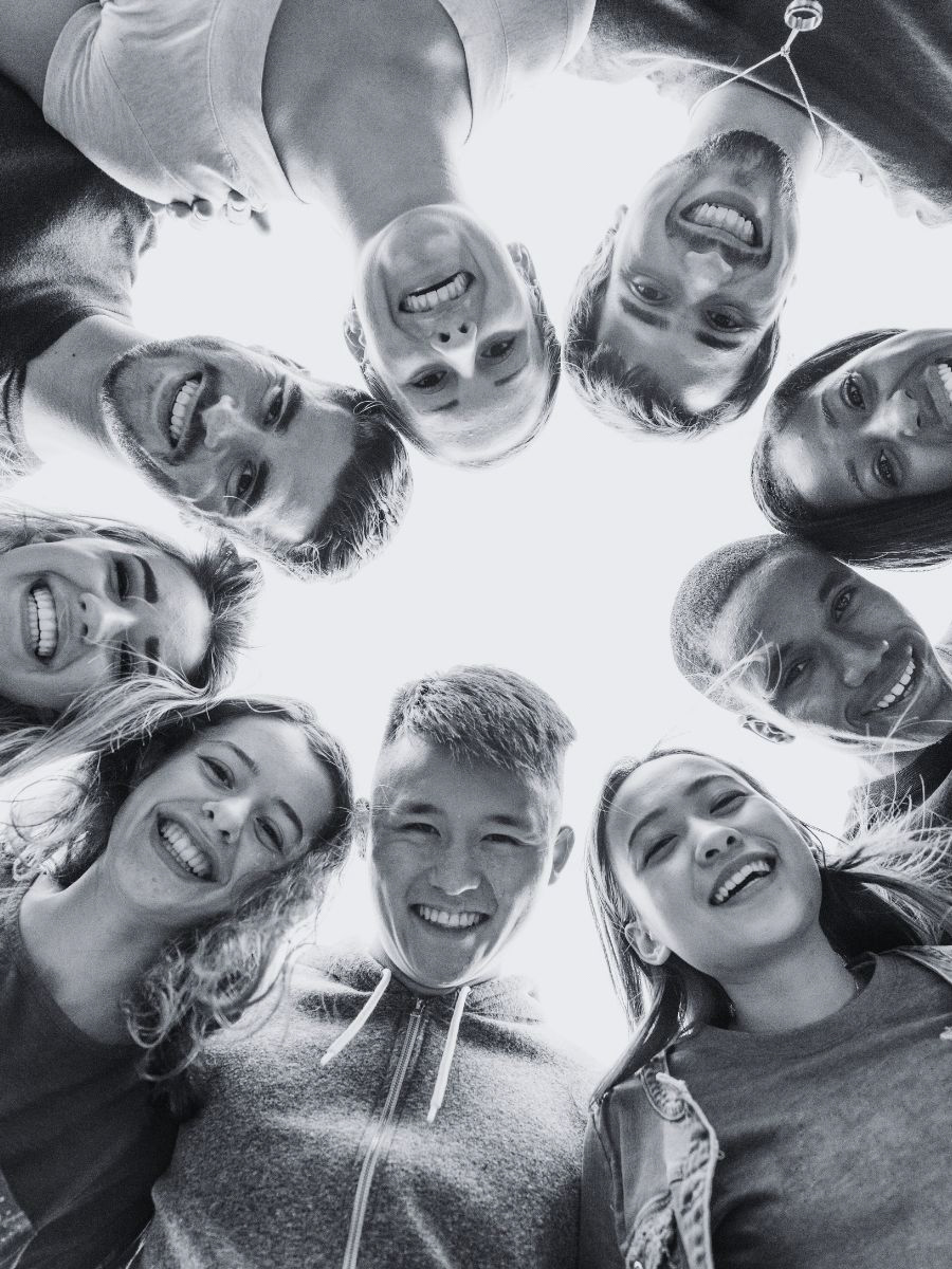 Smiling students on Neurodivergence-informed yoga course